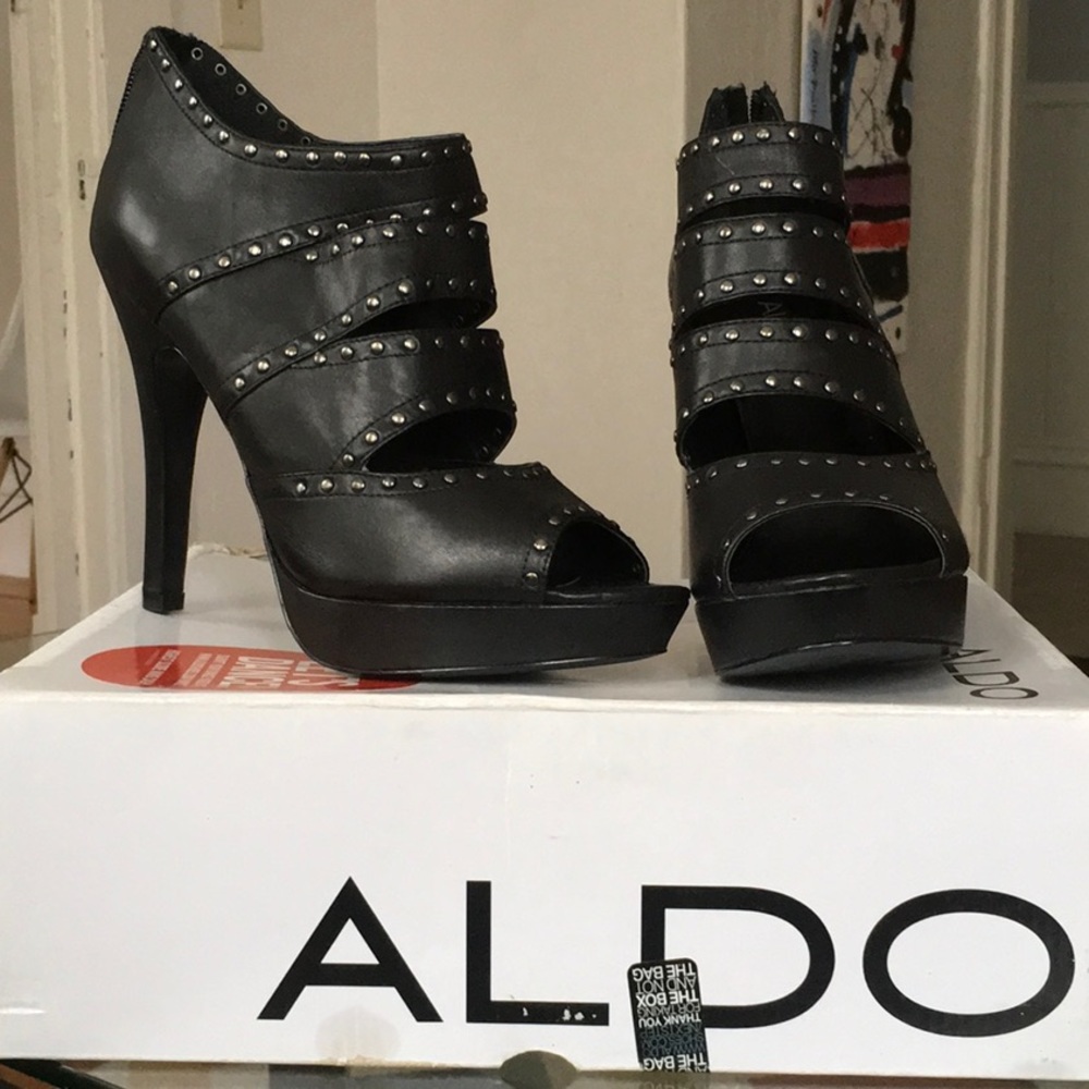 Black leather peep toe stilettos